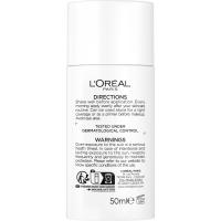Fluido anti manchas tono medio L`OREAL BRIGHT REVEAL, bote 50 ml